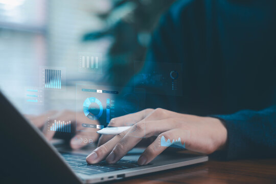 Businessman analyzing digital dashboards with charts and AI data on a laptop, showing data analytics, business intelligence, and performance tracking. technology digital data reporting dashboard