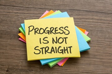 Colorful Sticky Notes with Inspirational Message on Wooden Table