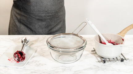 Lemon Spritz Cookie Sandwich with Cranberry Buttercream