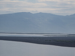 island, shore and rocks on the seashore in iceland