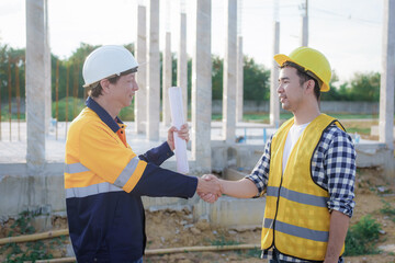 Diverse Team of Specialists Use Tablet Computer on Construction Site. Real Estate Building Project with Civil Engineer, Architect, Business Investor and General Worker Discussing Plan Details.