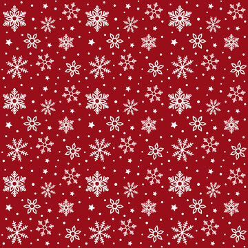 Seamless pattern snow illustrations in various sizes and variations on a red background perfect for Christmas. Great for wrapping paper and tablecloth designs.