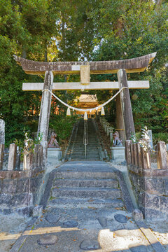 Stone torii gate and stone steps leading to Hachioji Shrine in Mizunami, Gifu, Japan