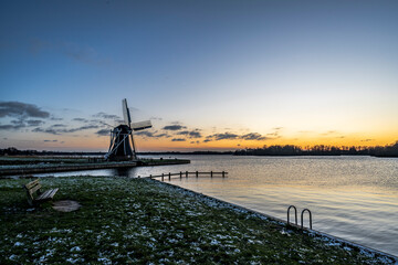 Winter Landscape With Dutch Windmill