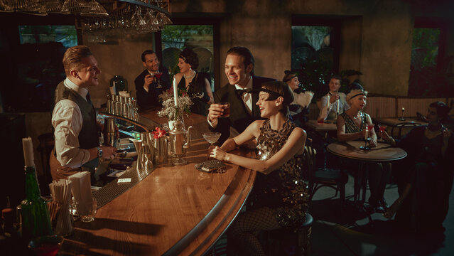 Vintage nightlife gathering at bar with guests enjoying cocktails. Concept of bar tour posters, cocktail menu visuals, themed-party marketing, premium alcohol branding, social nightlife promo.