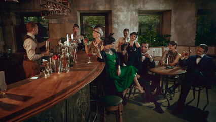 Vintage bar gathering with cheerful friends enjoying cocktails in glamorous retro style. Concept of nightlife campaigns, event marketing, premium alcohol branding with lively emotion.