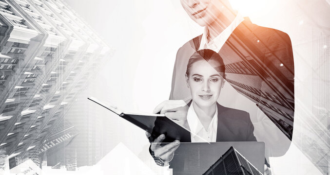 Business people with notebook and laptop in double exposure style, overlaid with modern city buildings on white background. Concept of teamwork and planning - Powered by Adobe