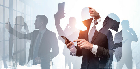 Silhouettes of businesspeople using smartphones overlaid with office background, symbolizing modern communication, multitasking and digital connectivity