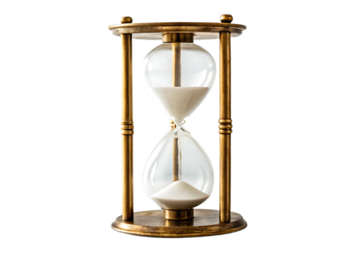 A close up shot of a brass hourglass with white sand against a black background in a studio setting