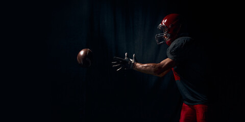 American football player reaching forward for ball with intense emotional urgency. Concept of catching drills, coaching diagrams, training apps, reaction education materials. Banner