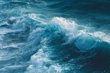 Fototapeta premium Dynamic ocean waves crash and foam with brilliant white spray against deep blue waters showcasing natural beauty and raw power