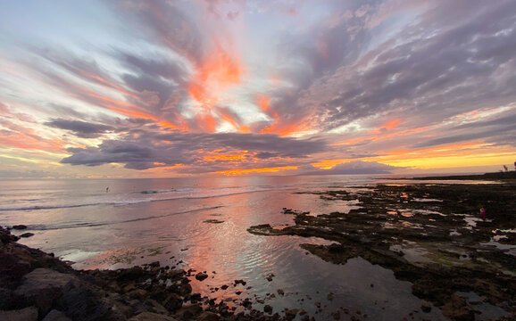 Beautiful ocean sunset in El Camison beach, Tenerife, Canary Islands, Spain. Travel concept.