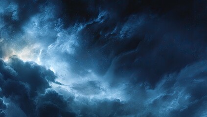 A dramatic skyscape reveals textured clouds in varying shades of blue. Light peeks through the formations