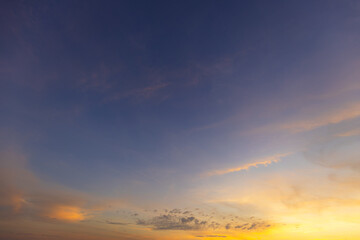 Orange sky and clouds in a bright morning,Orange clouds and morning sky,Real majestic sunrise sundown sky background with gentle colorful clouds without birds. Panoramic, big size.