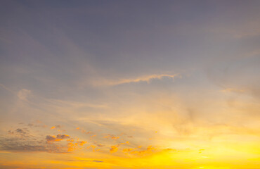 Orange sky and clouds in a bright morning,Orange clouds and morning sky,Real majestic sunrise sundown sky background with gentle colorful clouds without birds. Panoramic, big size.