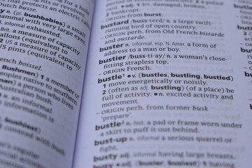 Obraz premium English Dictionary Page Close Up With The Word Of -bustle
