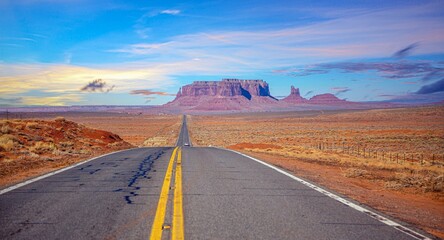 Monument Valley highway perspective with car