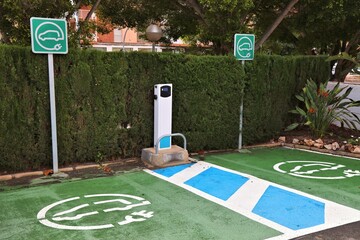 Electric vehicle charging station parking spot in Alicante, Spain.