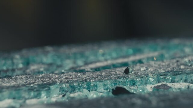 Vibrating Glass Shards on Sheet Surface