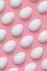 Repeat design of white eggs over pink background, creative flat lay from natural organic Chicken egg, minimal pastel pattern, for packaging and social media display, Easter food celebration concept.