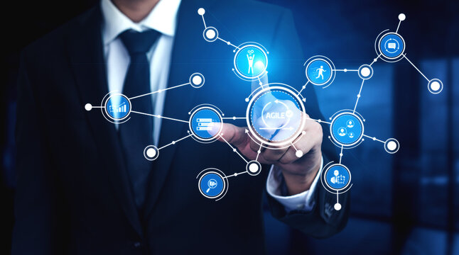 A professional businessman engaged with an advanced digital interface showcasing various technology icons. This image reflects modern business strategies and data interaction. Tessel - Powered by Adobe