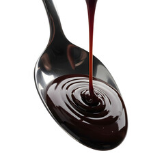 Dark Molasses Syrup Pouring onto a Spoon.