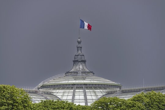 The French national flag, tricolour, on the Grand Palais, Paris, &Icirc;le-de-France, France