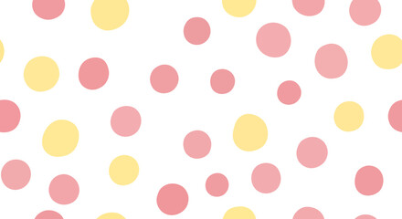 Playful polka dot pattern with pastel colors in shades of pink and yellow on white backdrop
