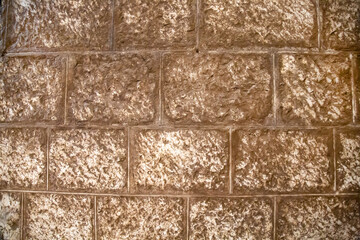 A wall background made of moldy tiles in the basement of a winery. Winemaking viticulture wine blend.