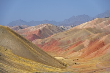 Mountain landscape with red and orange mountains, Kyrgyzstan