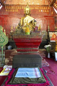 Golden Buddha statue, Bhumispara-mudra, Buddha Gautama at the moment of enlightenment, Wat Long Koon, Luang Prabang, Laos