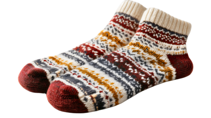 A pair of white and brown knitted socks isolated on a white background, warm winter wool clothing, traditional Christmas pattern accessories, a soft cozy foot wear object.
