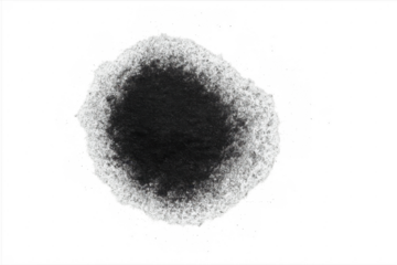 Black ink watercolor smudge stain on transparent background