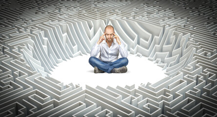 Man solving problem thinking in maze labyrinth