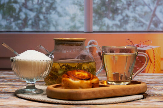 Winter tea setup on wooden table indoors