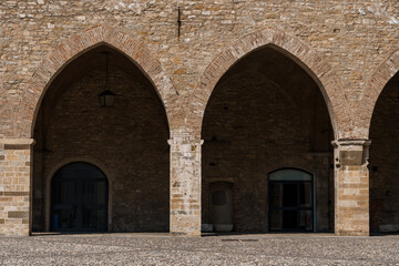 Bergamo's historic architecture under a bright blue sky