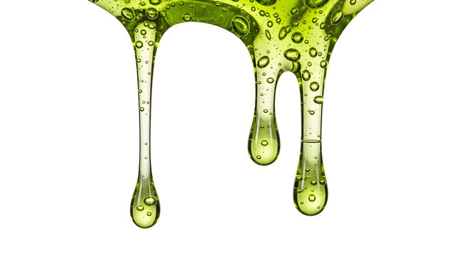 Viscous green liquid dripping with bubbles against black background