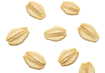 Individual light brown rolled oat flakes with fibrous texture and golden-brown hues, scattered sparsely on a pristine transparent background with copy space. Concept of natural goodness and wholesome