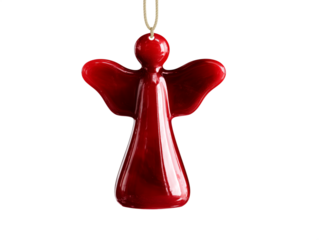 Red ceramic angel ornament hanging in soft light, creating a festive atmosphere 