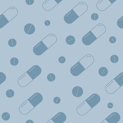 A seamless medical pattern with blue and white pills. A medicine background in blue colors.