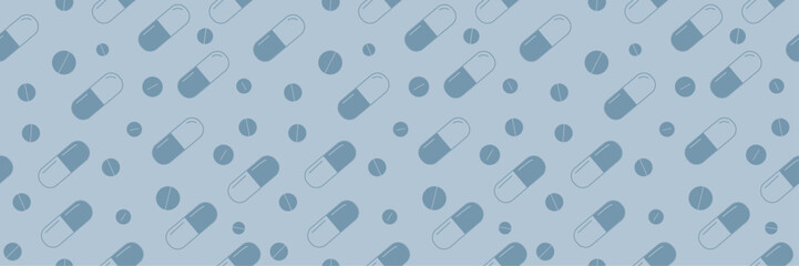 A seamless medical pattern with blue and white pills. A medicine background in blue colors.