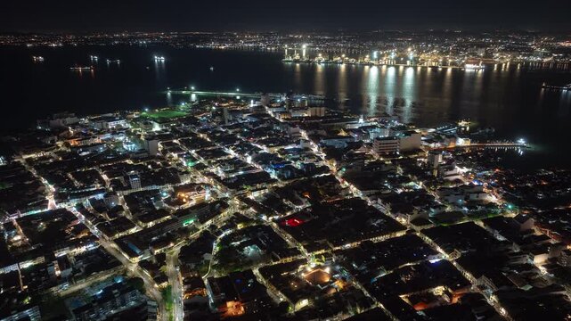 night time illumination penang island george town city bay butterworth coastline aerial panorama 4k timelapse malaysia