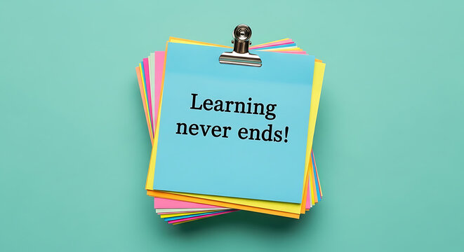 Stack of colorful sticky notes with the inspiring message learning never ends