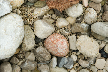 Varied Shades of Grey and Beige River Rocks