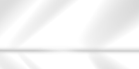 minimalist white room with sunlight streaming through window