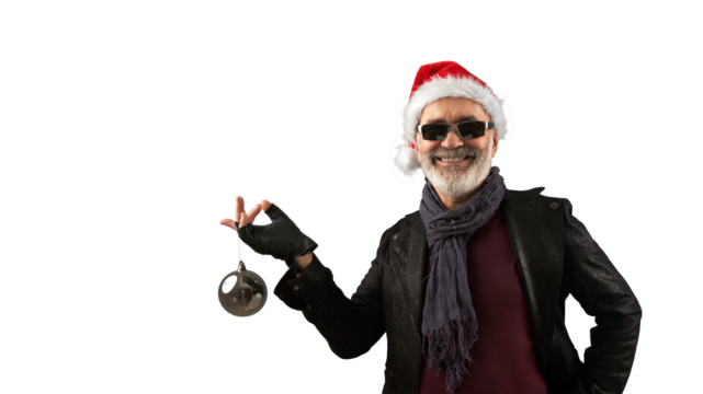 Smiling Santa rocker with a silver Christmas tree ball on the finger of his raised hand. Png.