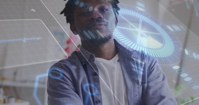 Standing mid adult man wearing white T-shirt and gray shirt, viewing AR HUD graphics in studio