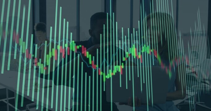 Analyzing 3 colleagues in office wear leaning over laptops at office table with stock overlay