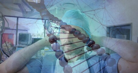 Adjusting surgeon securing turquoise cap and wearing light blue scrubs in OR, DNA helix overlay