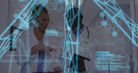 Gesturing physician and colleague studying tablet in clinic, wearing lab coats, showing AR overlay